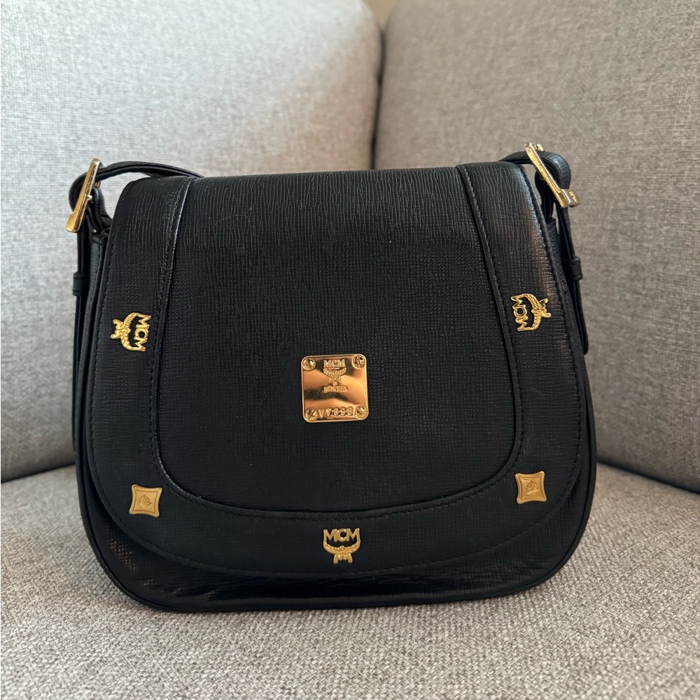 MCM Black Crossbody Bag with Gold Accents